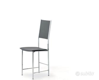 SEDIE IN PELLE NERA - CATTELAN