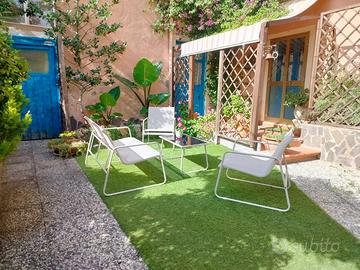 Trivano al piano terra con ampio cortile