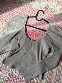 Top Zara a maniche lunghe a costa