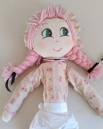 Bambola vintage in pezza con trecce rosa