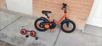 Bicicletta bimbo/a raggio 14 con rotelline. 