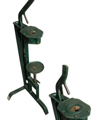 Antica tappatrice vintage manuale in ferro