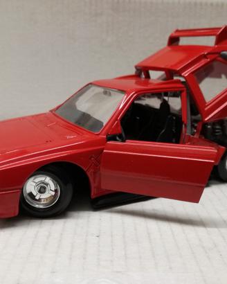 Modello auto lancia delta s4 rosso burago