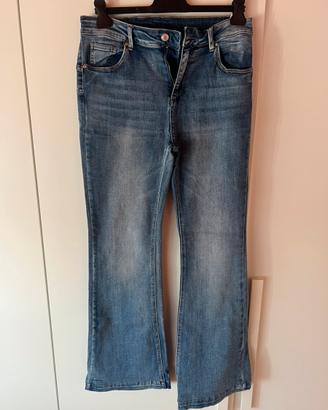 Jeans curvi blu a zampa effetto used
