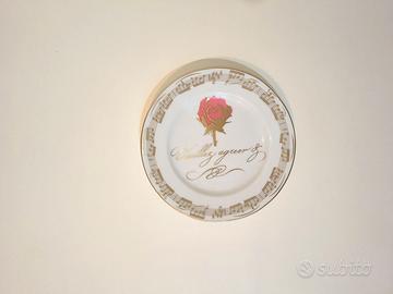 Piatto in porcellana Scavolini con decorazioni mus