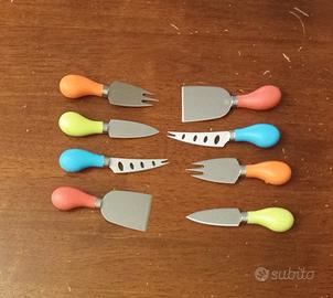 AMC  totale 8 coltellini per formaggio