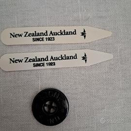 1 bottone Stone Island e due stecche camicia 