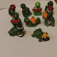 9 personaggi sorpresine come da foto 