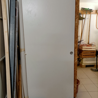 Porta scorrevole in rovere bianco a poro aperto