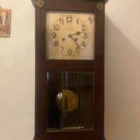 Orologio da muro a pendolo vintage