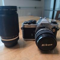 Macchina fotografica fm2 con due obiettivi