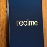 smartphone realme 9i con cover e caricabatterie 
