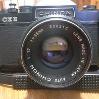 Macchina fotografica più teleobiettivo