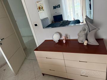 Camera da letto con cabina in vetro