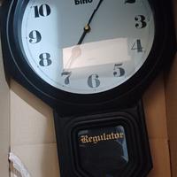 Orologio con pendolo bino vintage