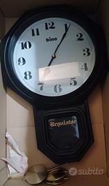 Orologio con pendolo bino vintage