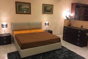 Stanza/ camera a correggio