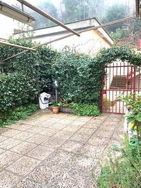 Appartamento con box auto e giardino