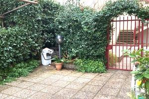 Appartamento con box auto e giardino