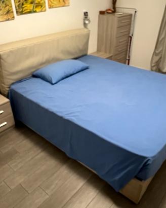 Camera completa con letto contenitore