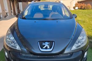Peugeot 308 2.0 HDi 136CV aut. SW Ciel Féline 7 po