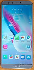 Honor Lite 9 grigio, custodia inclusa.