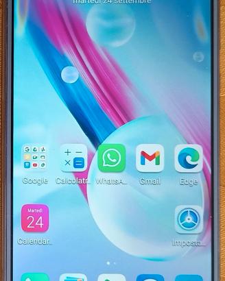 Honor Lite 9 grigio, custodia inclusa.