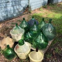 Damigiane di varie dimensioni in vetro