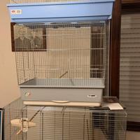 Tre gabbie con accessori come nuove