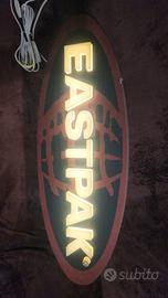 insegna Eastpak illuminata vintage 