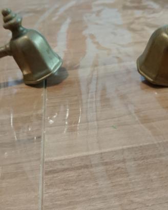 Coppia di eleganti spegnicandela vintage in ottone