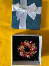 Spilla rosa con scatola nuova