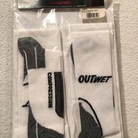 Calza sportiva a compressione graduata