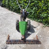 motocoltivatore con accessori 