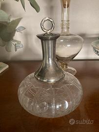 Bottiglia con tappo e parte superiore in argento