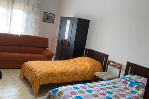 Stanza singola + balcone + posto auto