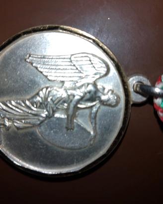 medaglia in argento con contorno oro 