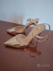 Scarpe eleganti oro con tacco