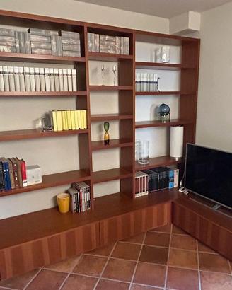 Libreria bifacciale con angolo componibile
