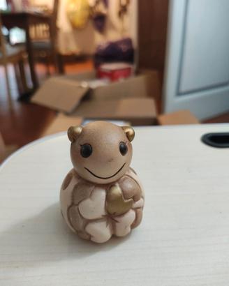 Thun statuetta beige e oro