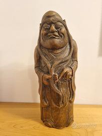 statua Daruma scolpita su bambù 