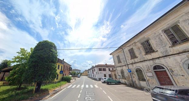 Trilocale con giardino e posto auto