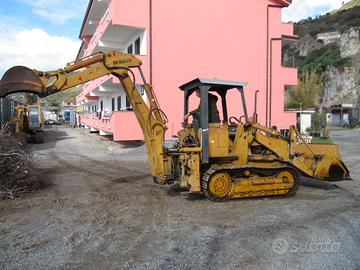 Pala cingolata con retroscavatore