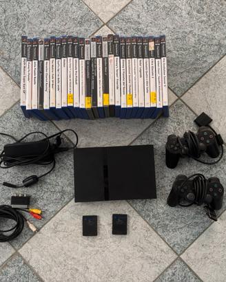 PlayStation 2 Slim + accessori + giochi