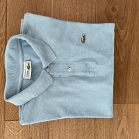 Polo Lacoste azzurra tg M