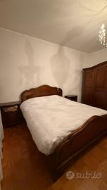 Camera da letto in legno massello