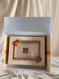 cornice quadrifoglio e coccinella thun 