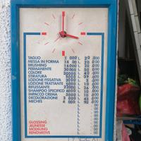 orologio pubblicitario loreal con prezzario 