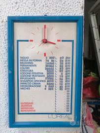 orologio pubblicitario loreal con prezzario 