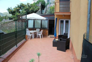 Trilocale con giardino